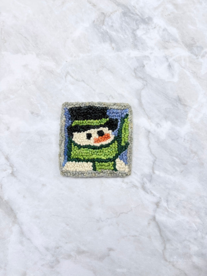 Finished Cozy Snowman punch needle mug rug sample