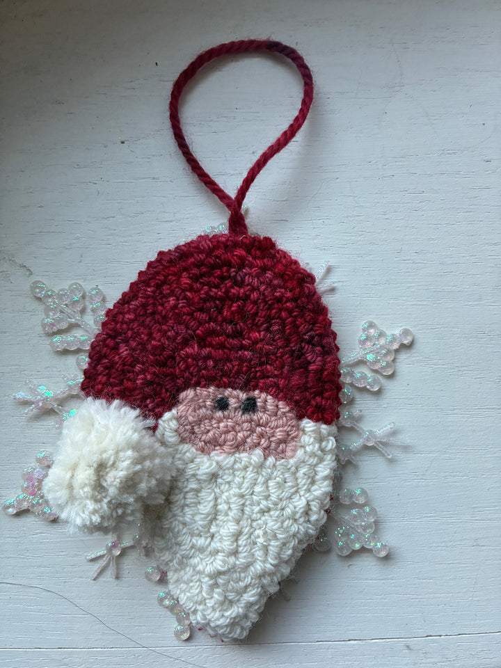 Finished punch needle Santa ornament sample