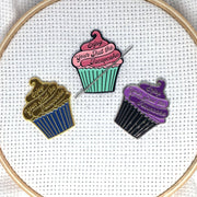 Enjoy Your Shut the Fucupcake Enamel Needle Minder Pink and Teal