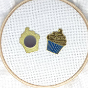 Enjoy Your Shut the Fucupcake Enamel Needle Minder Pink and Teal