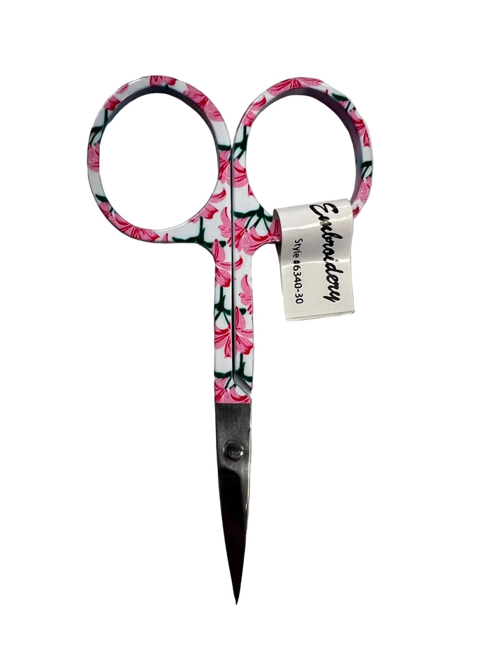 Scissors with floral handles on a white background