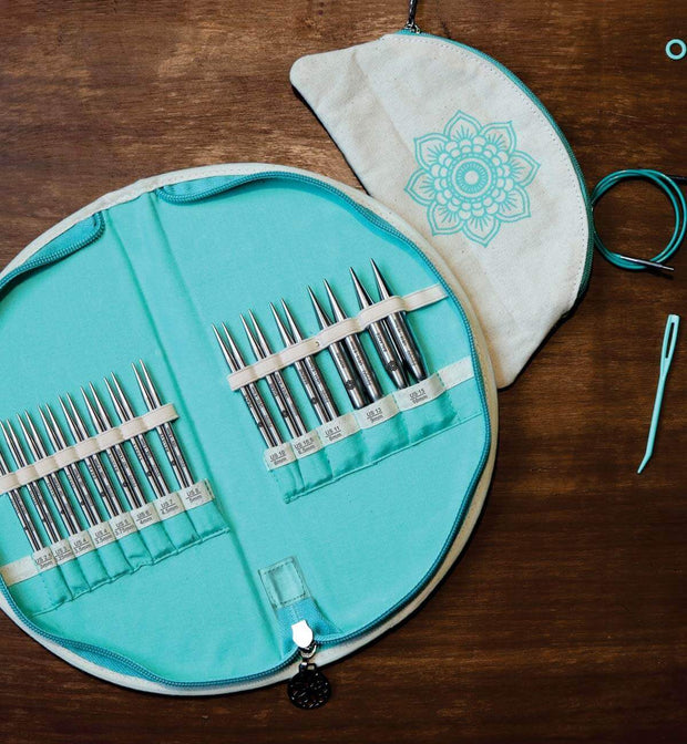 The perfect set for knitting hats, sleeves, mittens and other small diameter projects. Carrying 13 sizes, the needle tips in the Warmth set are lightweight & smooth.  The needle tips, the 6 smart cords & the complete selection of accessories offer a great value. The signature circular fabric needle case, with labeled sizes, plus the fabric pouch, will be appreciated by those who use it as well as those who see it.
