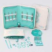 A set that brings together 7 of the most popular sizes, along with 4 smart cords and accessories. The assortment comes in a handy fabric case with a detachable multi-use pouch.  The stainless steel needle tips, with the perfect sharp points, work smoothly when paired with memory and kink-free cords. This set is conveniently portable and ideal for all compact knit-in-the-round projects