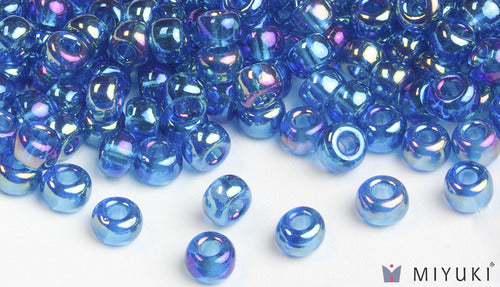 Transparent Capri Blue AB 6/0 Glass Beads