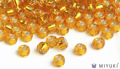 Silverlined Light Orange 6/0 Glass Beads